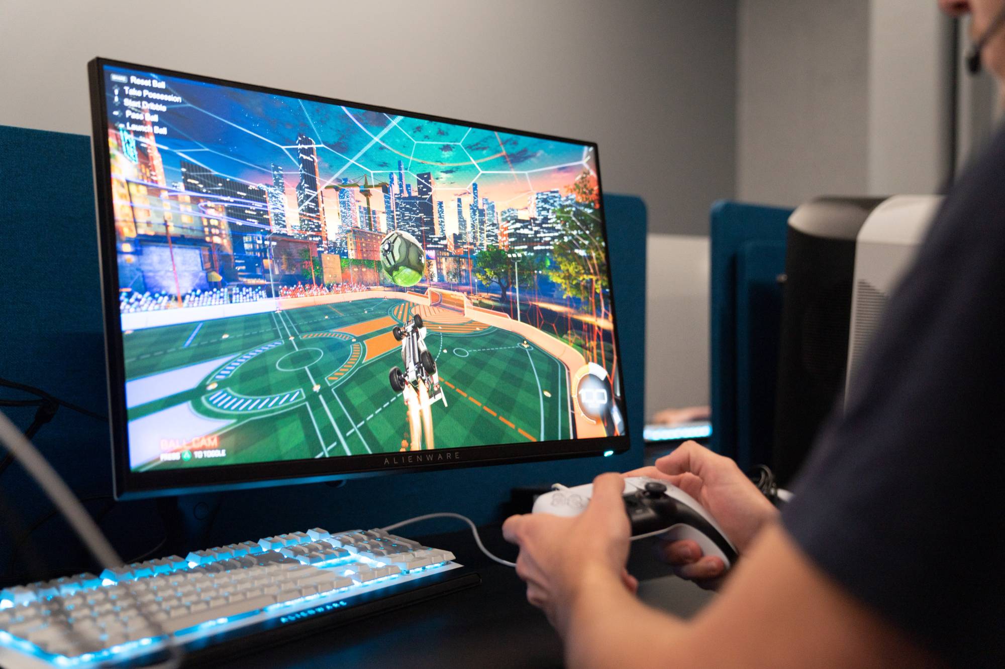 person in the laker esports center playing rocket league